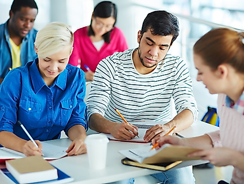 attentive-adults-studying-together-at-bright-desk-2026-09-22-01-38-35-utc