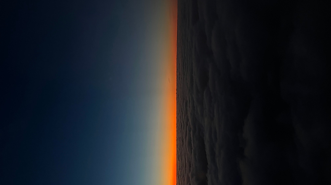 Sonnenuntergang über den Wolken