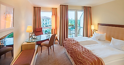 zimmer_deluxe_loggia_i_c-castanea-resort