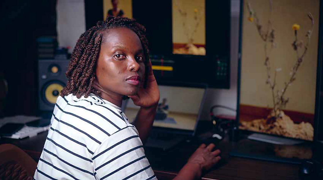 Rehema Chachage editing her films for the exhibition Amani kukita | kung'oa