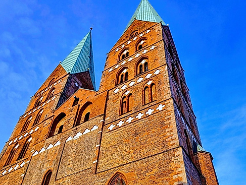 Gottesdienst zum Jahreswechsel mit Pauken und Trompeten mit Propst Oliver Erckens