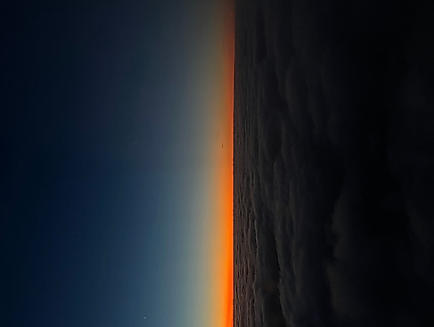 Sonnenuntergang über den Wolken