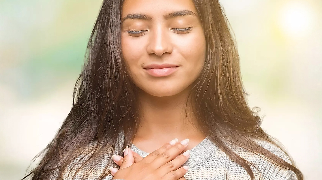 Junge Frau im Gebet oder Meditation